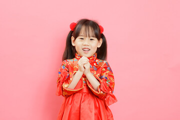 young Chinese girl with traditional dressing up celebrating Chinese New Year