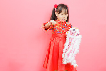 young Chinese girl with traditional dressing up celebrate Chinese New Year