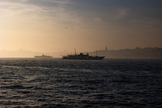 Istanbul background photo. Ferry and cityscape of Istanbul at foggy weather