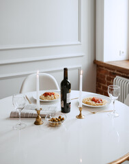 evening dinner with candles and wine