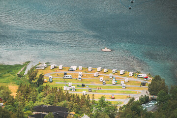 Geirangerfjord, Norway. Caravan Motorhome Cars Parking Near Harbor. Aerial View In Summer Day....