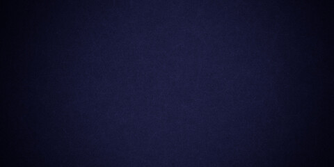 Dark blue background texture with black vignette in old vintage grunge textured border design, dark elegant teal color wall with light
