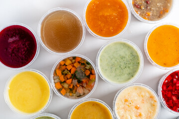 Top view of bowl with different soups