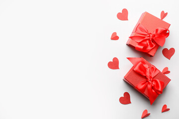 Gifts for Valentine's Day and hearts on white background