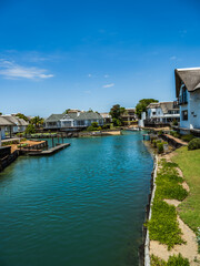 Fototapeta na wymiar St Francis bay canal and houses on the canal side in South Africa