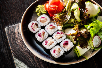 sushi on the black plate