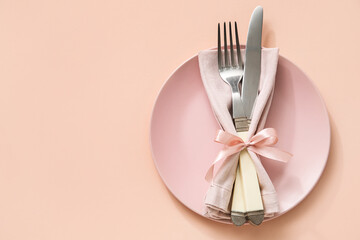 Stylish table setting on pink background