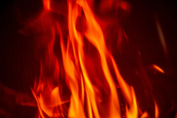 Fototapeta premium Flame of fireplace with black background