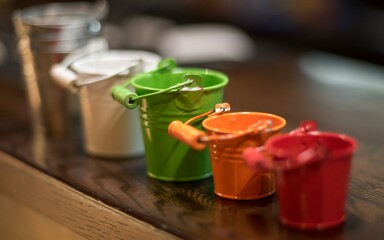 Multi-colored small decorative buckets: for flowers, snacks, paper clips and other small things