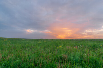 Red dawn over the field