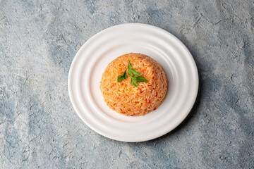 Traditional delicious Turkish food; rice pilaf with tomatoes (Turkish name; Domatesli pirinc pilavi)
