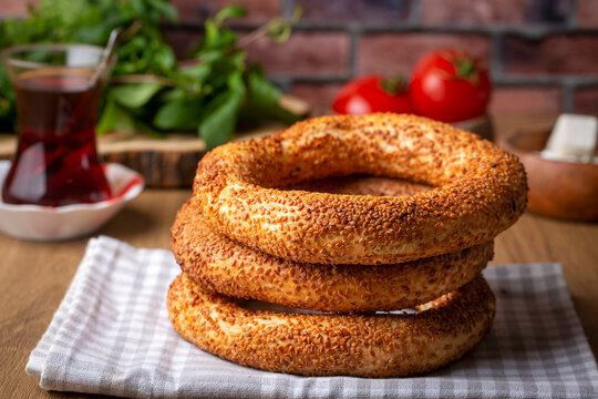 Turkish fast food bagel called Simit. Turkish bagel Simit with sesame. Bagel is traditional Turkish bakery food. Turkish name; simit - gevrek