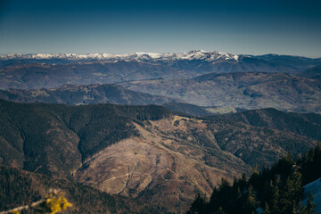 Winter mountains remnants of snow, spring, coniferous forest