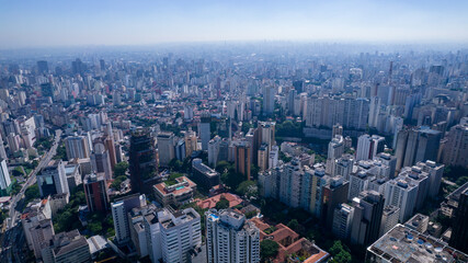 Fototapeta na wymiar Aerial view of Av. Paulista in São Paulo, SP. Main avenue of the capital. With many radio antennas, commercial and residential buildings. Aerial view of the great city of São Paulo.