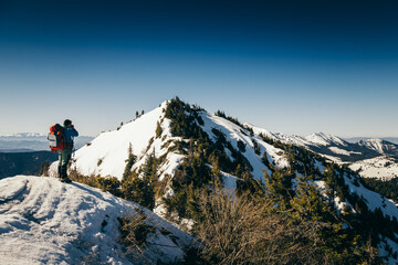 Mountains, coniferous forest in the snow, tourist, spring, winter