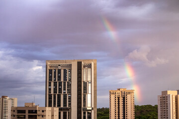 rainbow over city