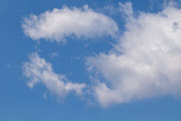 white clouds in a blue sky