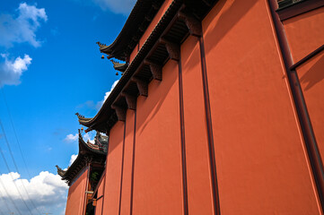 Fototapeta na wymiar red brick building with sky