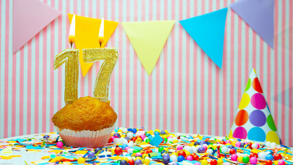 Happy birthday candles to 16 year old. Copy space Happy birthday greetings for 17 years old, lit...