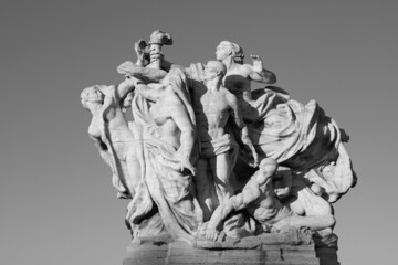 Fototapeta na wymiar ROME, ITALY - SEPTEMBER 1, 2021: The sculpture The Fidelity to the Statute marble on the Ponte Vittorio Emanuele II bridge by Giuseppe Romagnoli (1910).