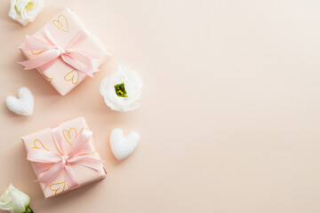 Valentine's day banner mockup with gifts and rose buds on beige background. Top view, flat lay