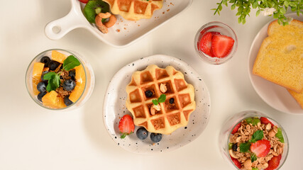 Delicious pastries on white table. top view