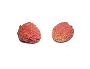 Lychee on the table. Chinese plum on a white background. Ripe fruit from Asia. Delicious  product.