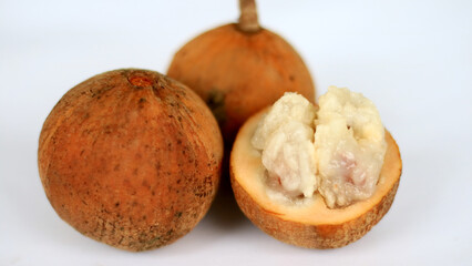 Wild mangosteen or kecapi on white background. 