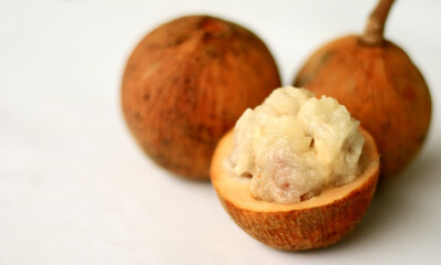 Wild mangosteen or kecapi on white background. 