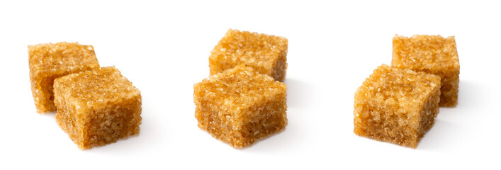 Brown sugar cubes isolated on white background