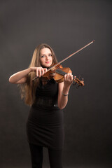 violinist in a black dress