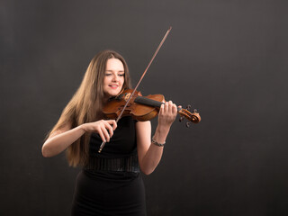 studio portrait of a violinist