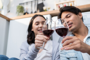 Asian young new marriage couple spend time together in kitchen at home. 