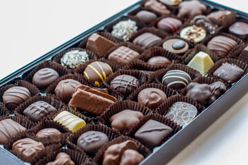 Assorted Chocolate Box on the White Table