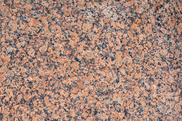 Close up, natural dark red granite marble texture.