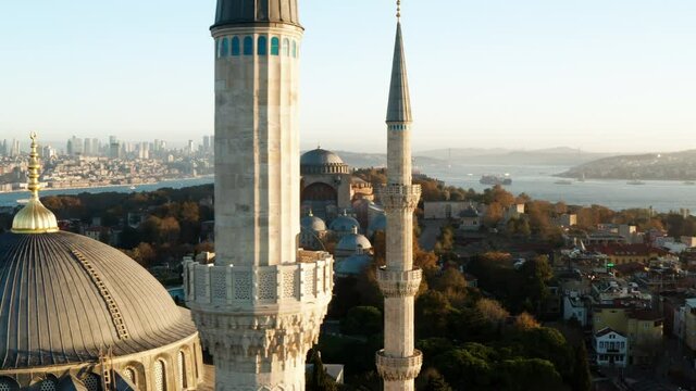Minarets Of Blue Mosque With Hagia Sophia Mosque In The Background At Sunrise In Fatih, Istanbul, Turkey. - aerial