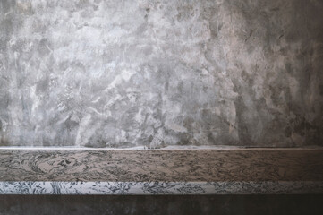 Empty top of marble shelves and concrete wall background. For product display.