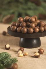 winter food background with macadamia nuts