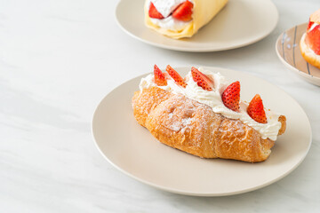 strawberry fresh cream croissant on plate