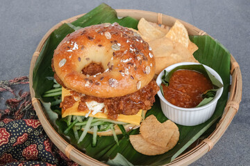 Homemade pastry meal. Chicken Bagel Satay with Spicy Peanut Gravy. Ideal for lunch or dinner meal