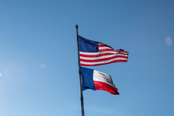 United States with Texas Flag Below Waving Ray of Sunlight