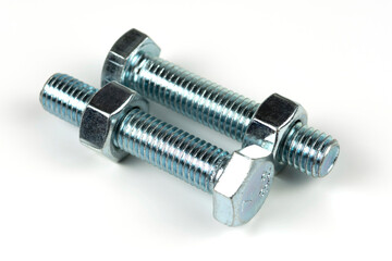 close up bolts and nuts isolated on white