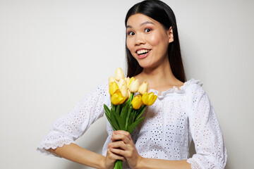 Charming young Asian woman in a white shirt flowers spring posing Lifestyle unaltered