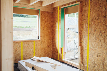 Corner view of chipboard clad walls in a new build house