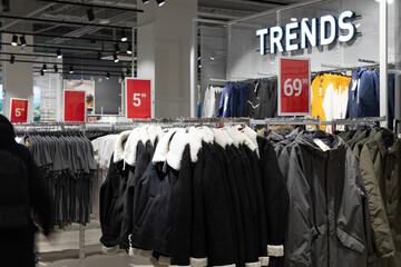 interior of a large store selling jeans and jackets