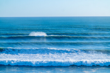 Cyclone Cody large waves and swells rolling in from horizon at Mount Maunganui