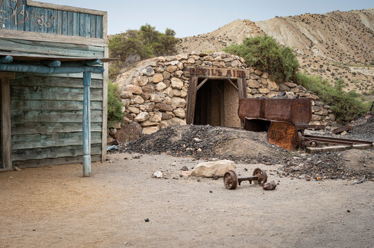Rusty wagon in the old abandoned gold mine in the old west