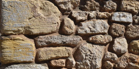 Fondo de ladrillos de piedra apilados.