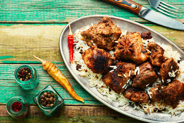 Vindaloo, meat in fried spices.