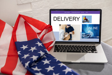 Online shopping. laptop with banner delivery